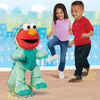 Elmo Dino Tape du Pied Sesame Street, Animal en Peluche de 33 cm (13 pouces) Chante et Danse