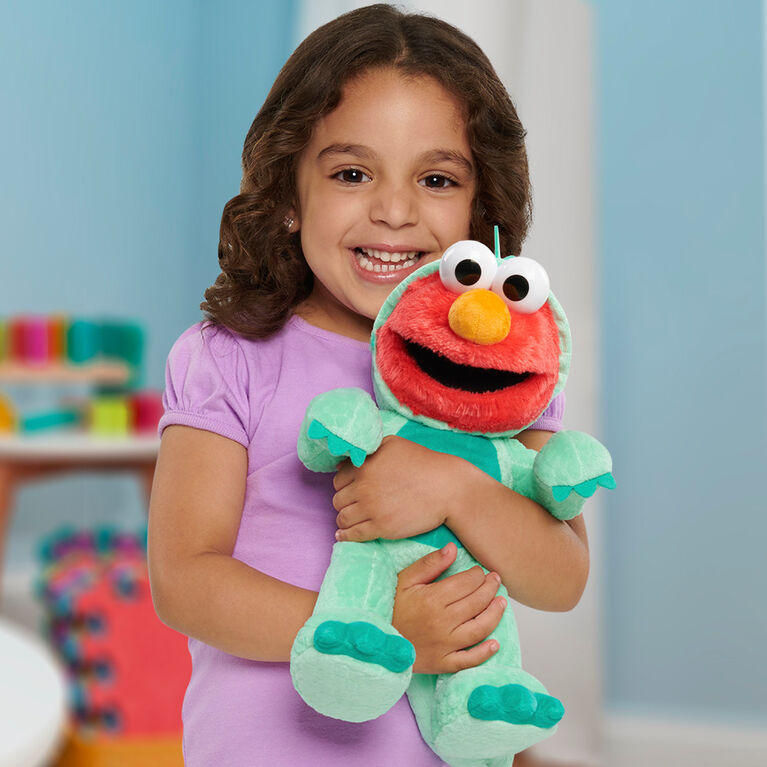 Sesame Street Dino Stomp Elmo 13-Inch Plush Stuffed Animal Sings and Dances - English Edition