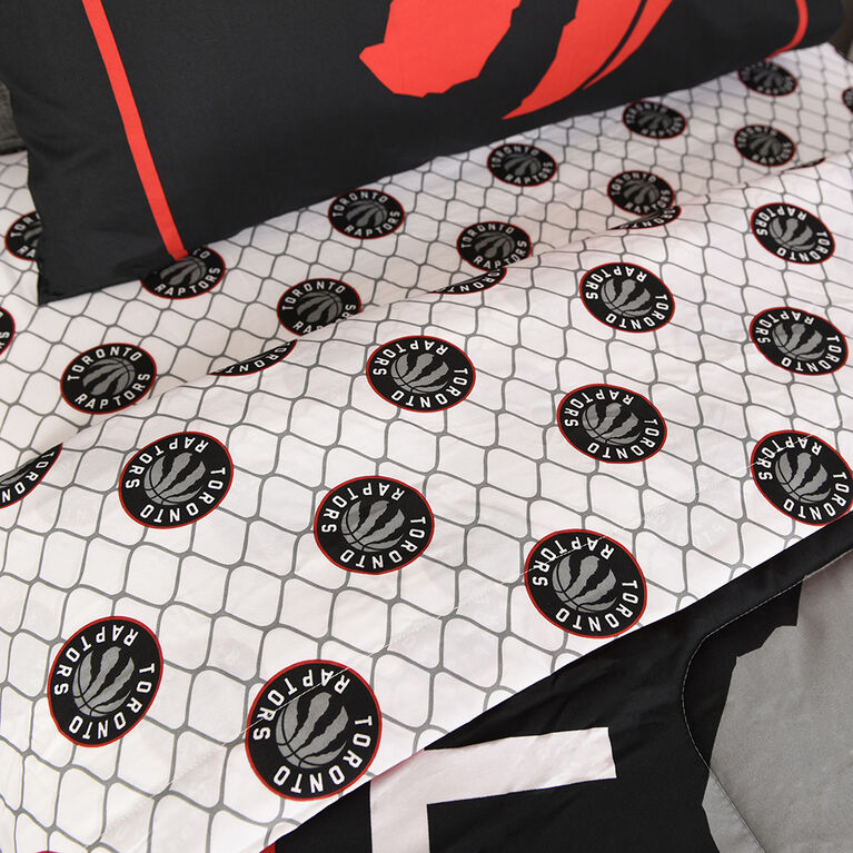 NBA Toronto Raptors 4 Piece Twin Bedding Set with Reversible Comforter, Fitted Sheet, Flat Sheet and Pillowcase by Nemcor