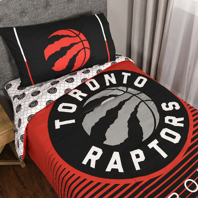 NBA Toronto Raptors 4 Piece Twin Bedding Set with Reversible Comforter, Fitted Sheet, Flat Sheet and Pillowcase by Nemcor