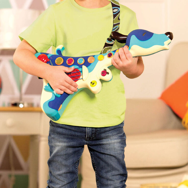 B. Toys Woofer, Interactive Dog Guitar