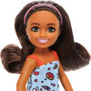 Barbie Chelsea Doll, Small Doll Wearing Removable Blue Dress with Brown Hair & Green Eyes