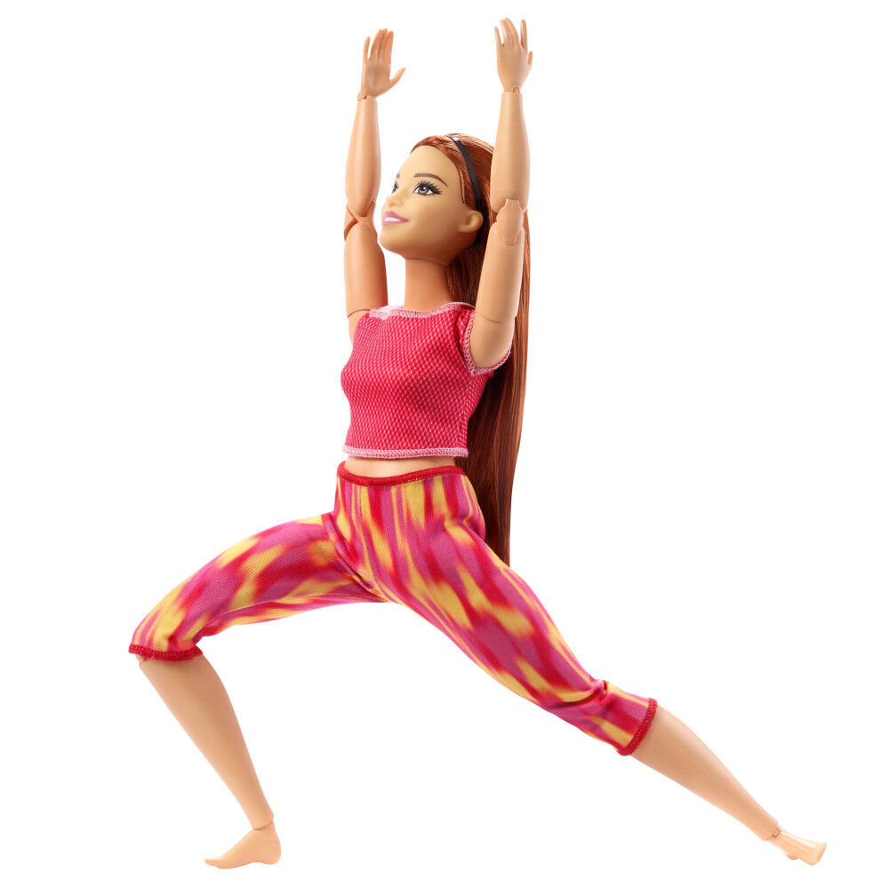 Poupee Barbie Fitness aux formes athletiques et aux longs cheveux roux et raides en tenue de sport avec 22 points d articulation