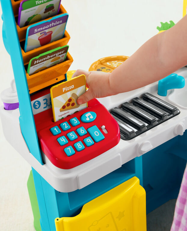 Fisher-Price - Rires et Éveil - Camion-restaurant Bouchée de plaisir - Édition anglaise