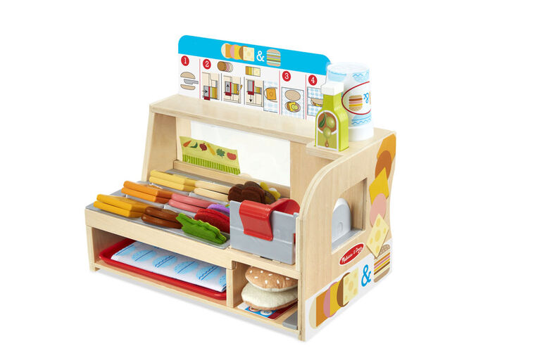 Melissa & Doug Comptoir sandwich et trancheur de bois avec trancheuse de charcuterie - Édition anglaise - les motifs peuvent varier