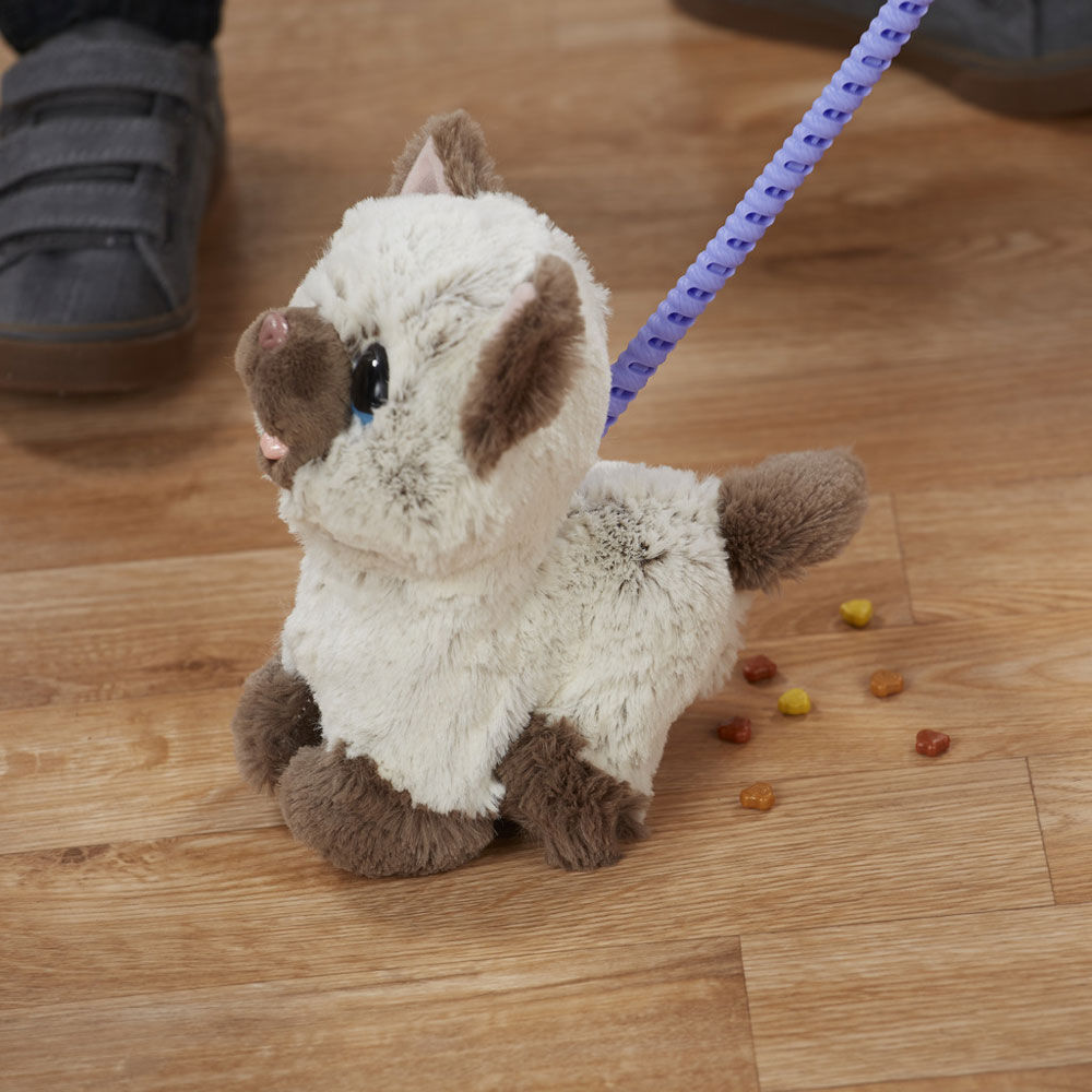 toy dog that walks eats and poops