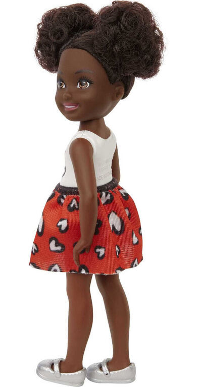 ​Barbie Chelsea Doll Wearing Skirt with Heart-Print and Metallic Shoes