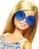 Barbie Doll and Clothing Set with 4 Complete Outfits