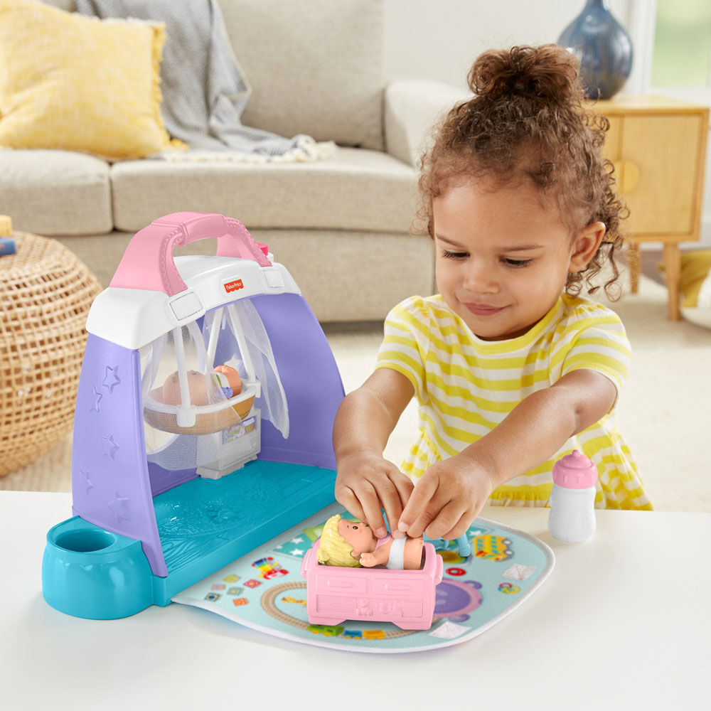 little people cuddle and play nursery