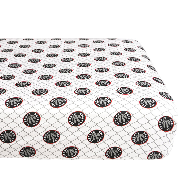 NBA Toronto Raptors 4 Piece Twin Bedding Set with Reversible Comforter, Fitted Sheet, Flat Sheet and Pillowcase by Nemcor