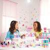 Coffrets Maison de poupée ​Mini BarbieLand Barbie, Maison de rêves Mini avec poupée Barbie surprise de 3,81 cm (1,5 po), mobilier, accessoires, ascenseur et piscine