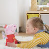 Peppa Pig Oink-Along Songs Peppa Singing Plush Doll with Sparkly Red Dress and Bow, Sings 3 Songs - French Edition