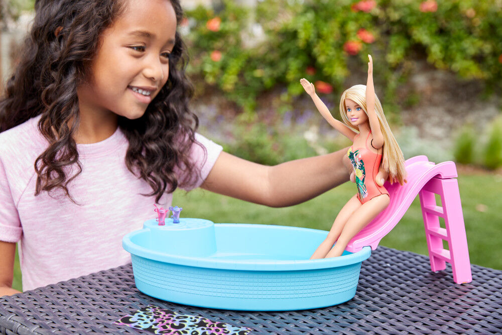 barbie having a baby in the pool