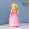 Super Mario Bros Le Film - Série de figurines de 5" avec accessoire - Figurine Princesse Peach avec Parapluie comme accessoire