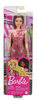 Poupée Barbie, vêtue d'une robe rose étincelante, de chaussures argentées et d'un bracelet argenté