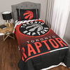 NBA Toronto Raptors 4 Piece Twin Bedding Set with Reversible Comforter, Fitted Sheet, Flat Sheet and Pillowcase by Nemcor