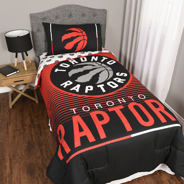 NBA Toronto Raptors 4 Piece Twin Bedding Set with Reversible Comforter, Fitted Sheet, Flat Sheet and Pillowcase by Nemcor