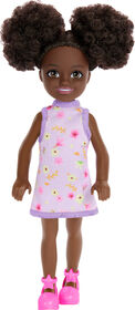 Barbie Chelsea Doll, Small Doll Wearing Removable Purple Floral Dress with Space Buns & Brown Eyes
