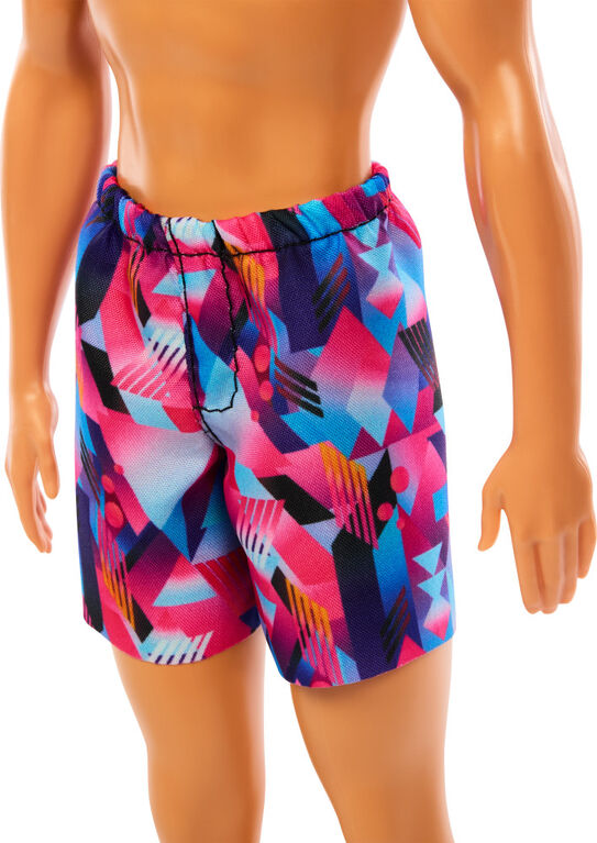 Beach Ken Doll with Blond Hair Wearing Purple Swimsuit