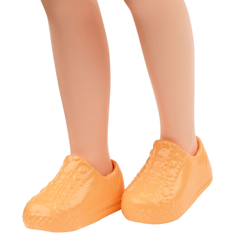 Barbie Club Chelsea Doll (6-inch) with Red Hair Sloth Graphic and Skirt