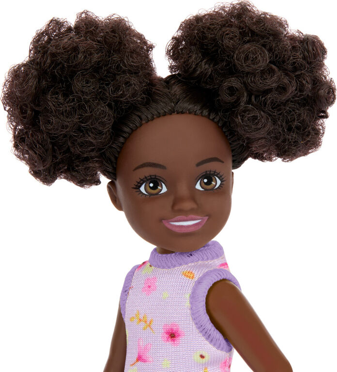 Barbie Chelsea Doll, Small Doll Wearing Removable Purple Floral Dress with Space Buns & Brown Eyes