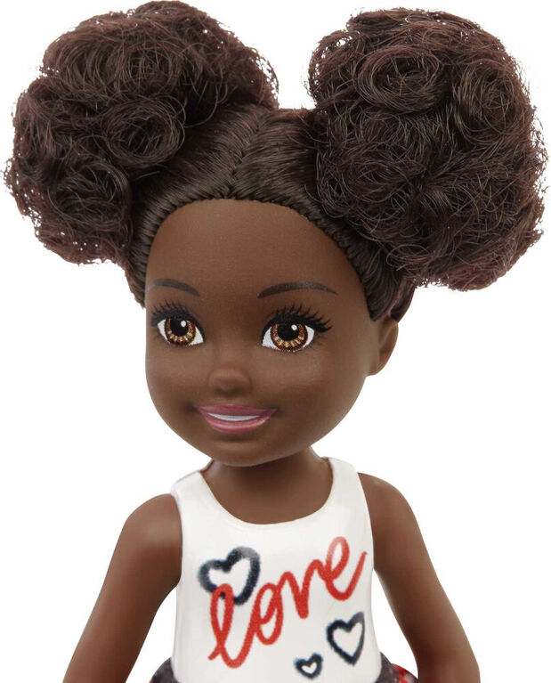 ​Barbie Chelsea Doll Wearing Skirt with Heart-Print and Metallic Shoes
