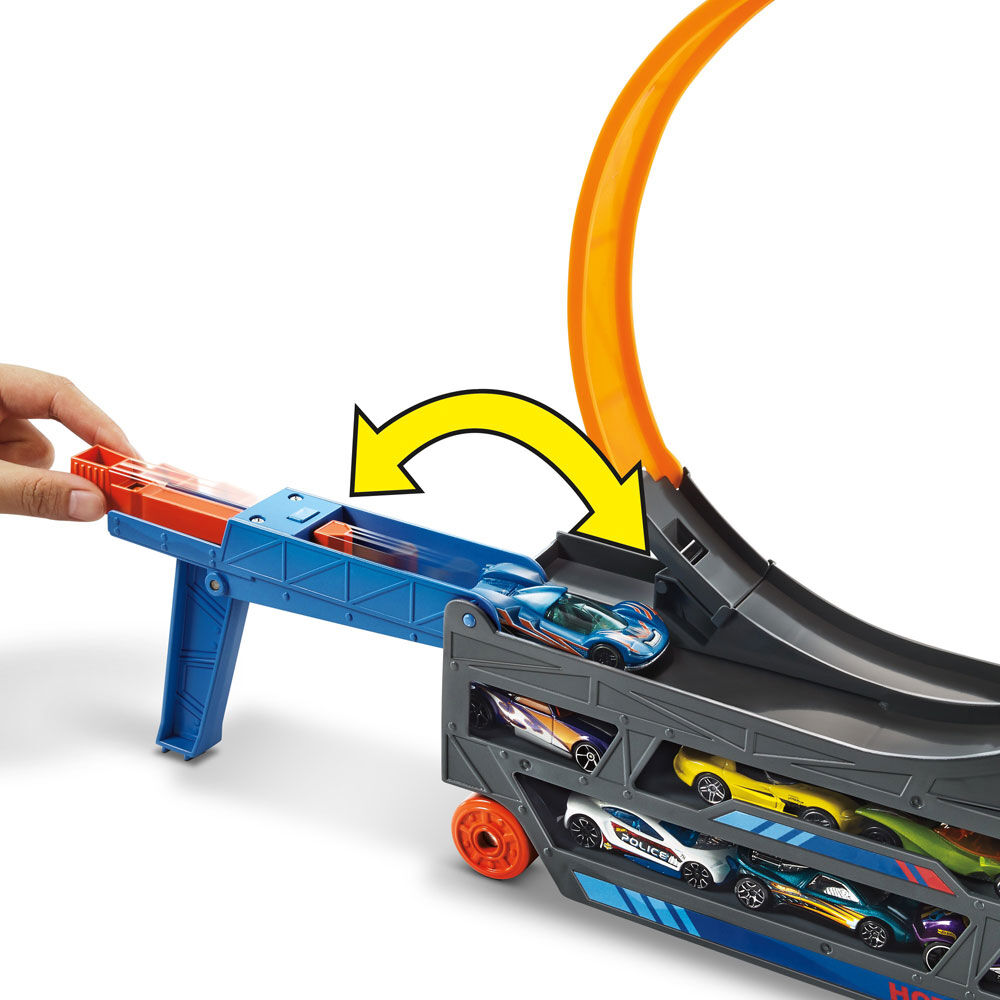 hot wheels stunt & go hauler with 10 vehicles