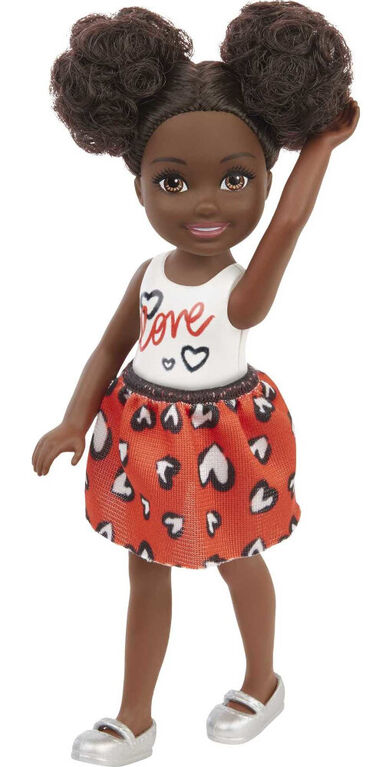 ​Barbie Chelsea Doll Wearing Skirt with Heart-Print and Metallic Shoes