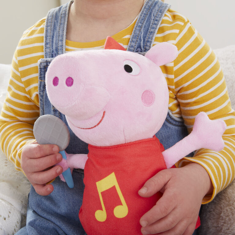 Peppa Pig Oink-Along Songs Peppa Singing Plush Doll with Sparkly Red Dress and Bow, Sings 3 Songs - French Edition