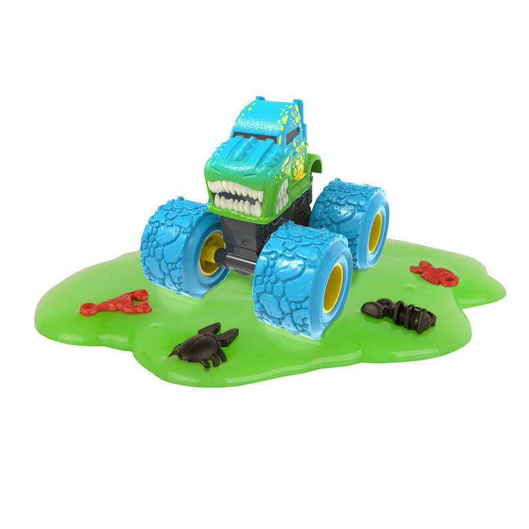 De véritables véhicules-jouets Monster Treads, sac opaque avec de la boue pour une expérience unique de déballage.