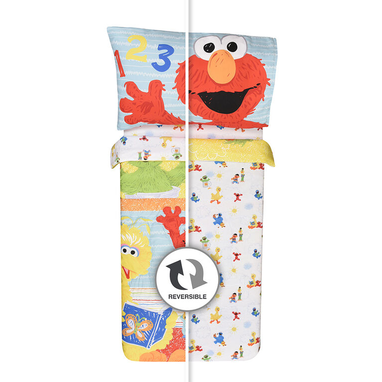 Sesame Street 3 Piece Toddler Bedding Set with Reversible Comforter, Fitted Sheet and Pillowcase by Nemcor