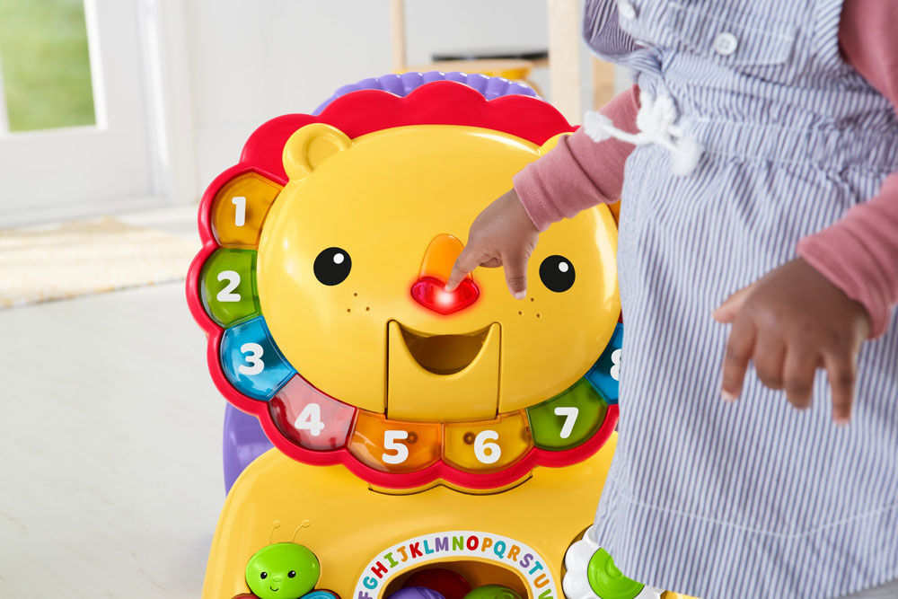 Fisher price lion ride on discount walker