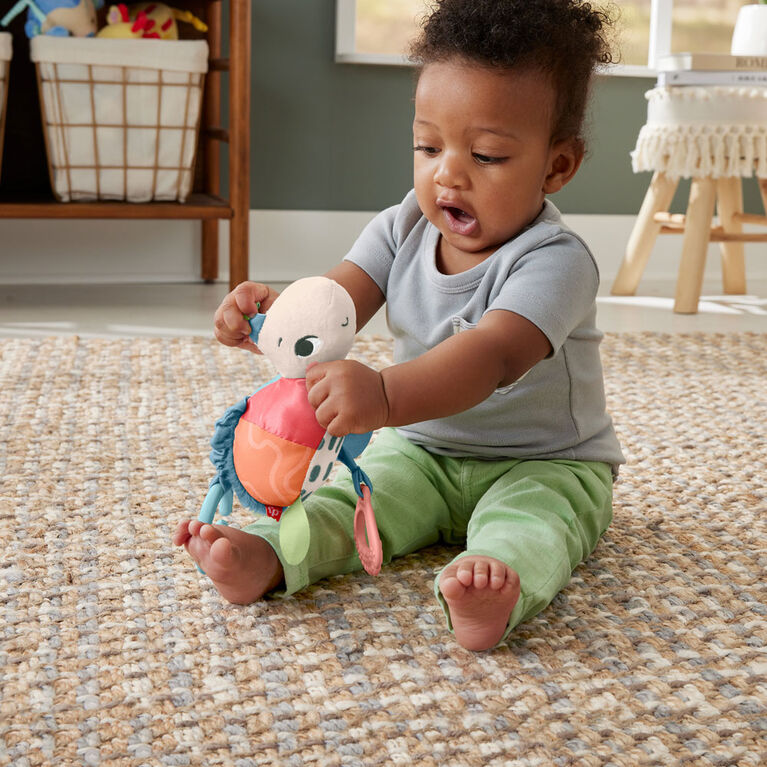 Fisher-Price Planet Friends Sea Me Bounce Turtle Baby Stroller Toy with Sensory Details Newborns